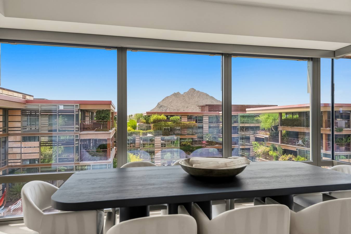 Dining with floor-to-ceiling mountain views