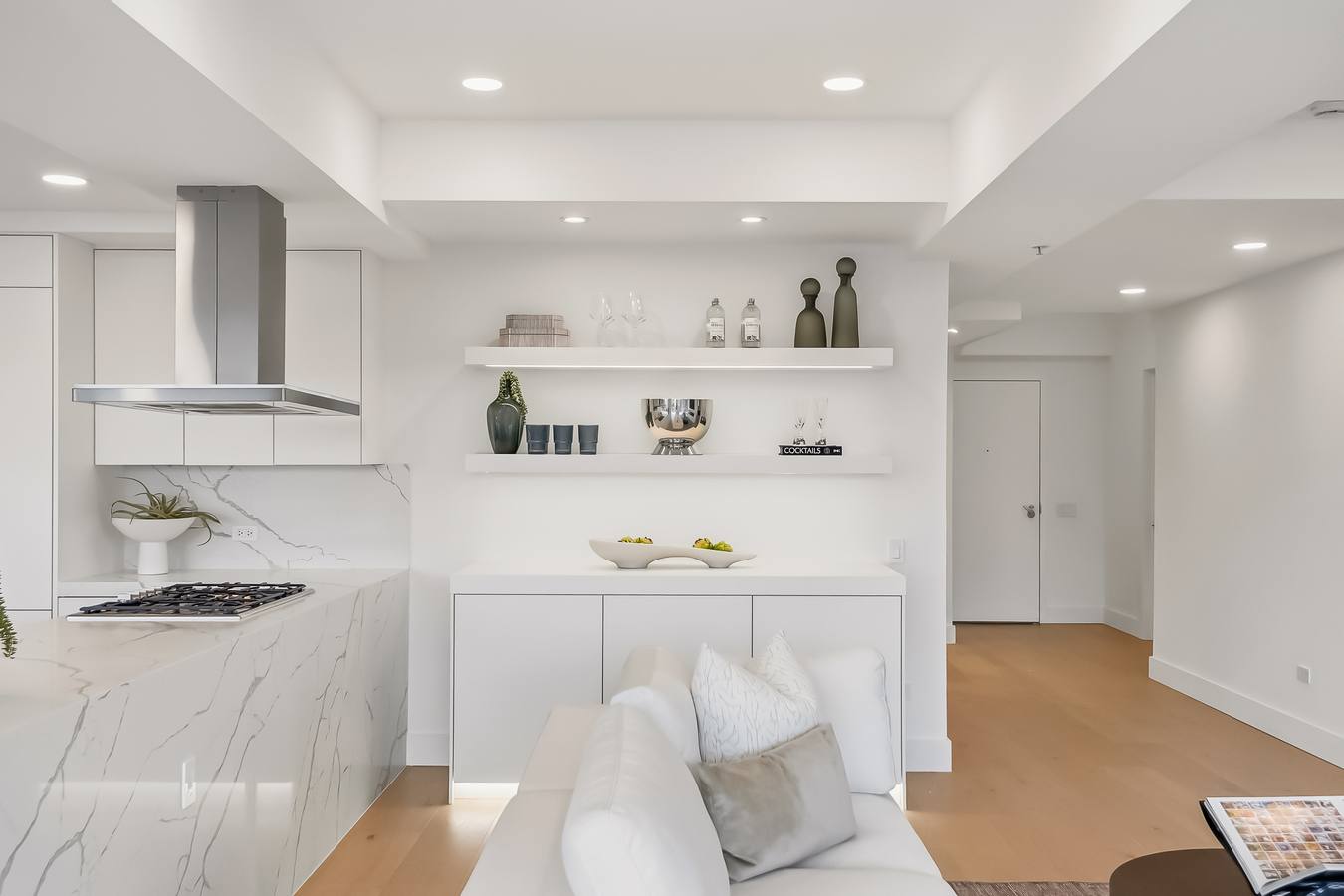 Kitchen bar with lighted shelving