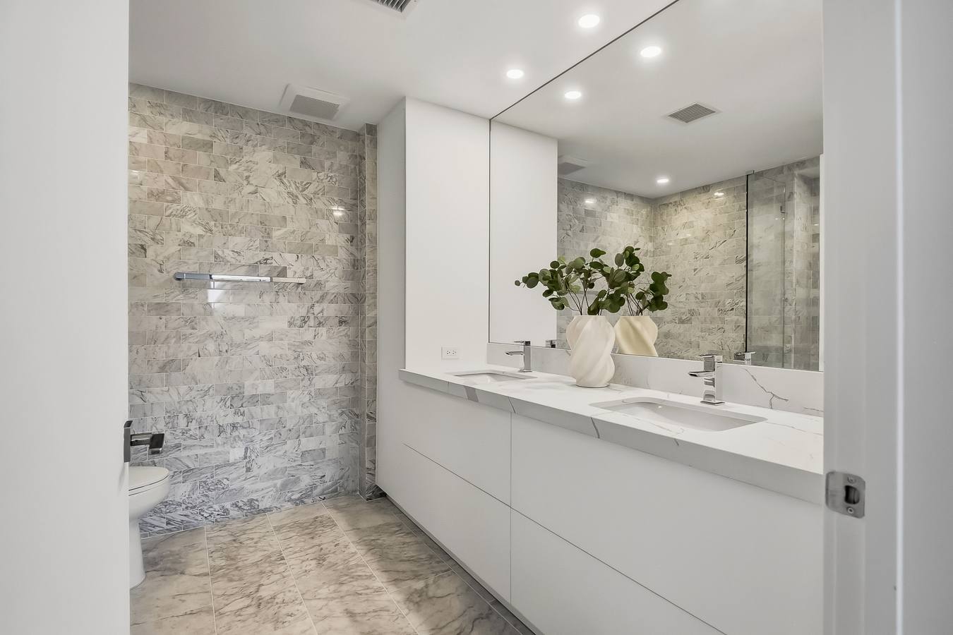 Primary bath with Bianco Carrara marble